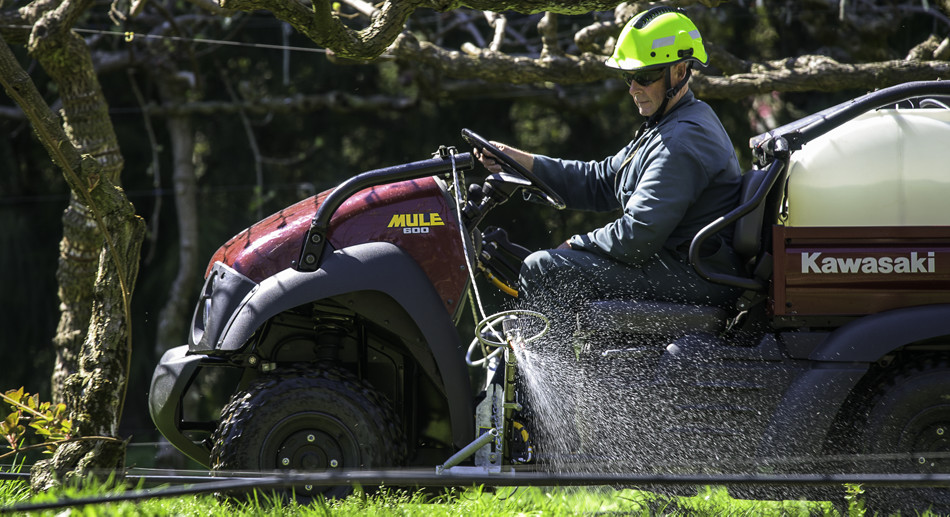 A Kawasaki Mule unit can deliver the most effective weed control possible in the sensitive orchard environment.